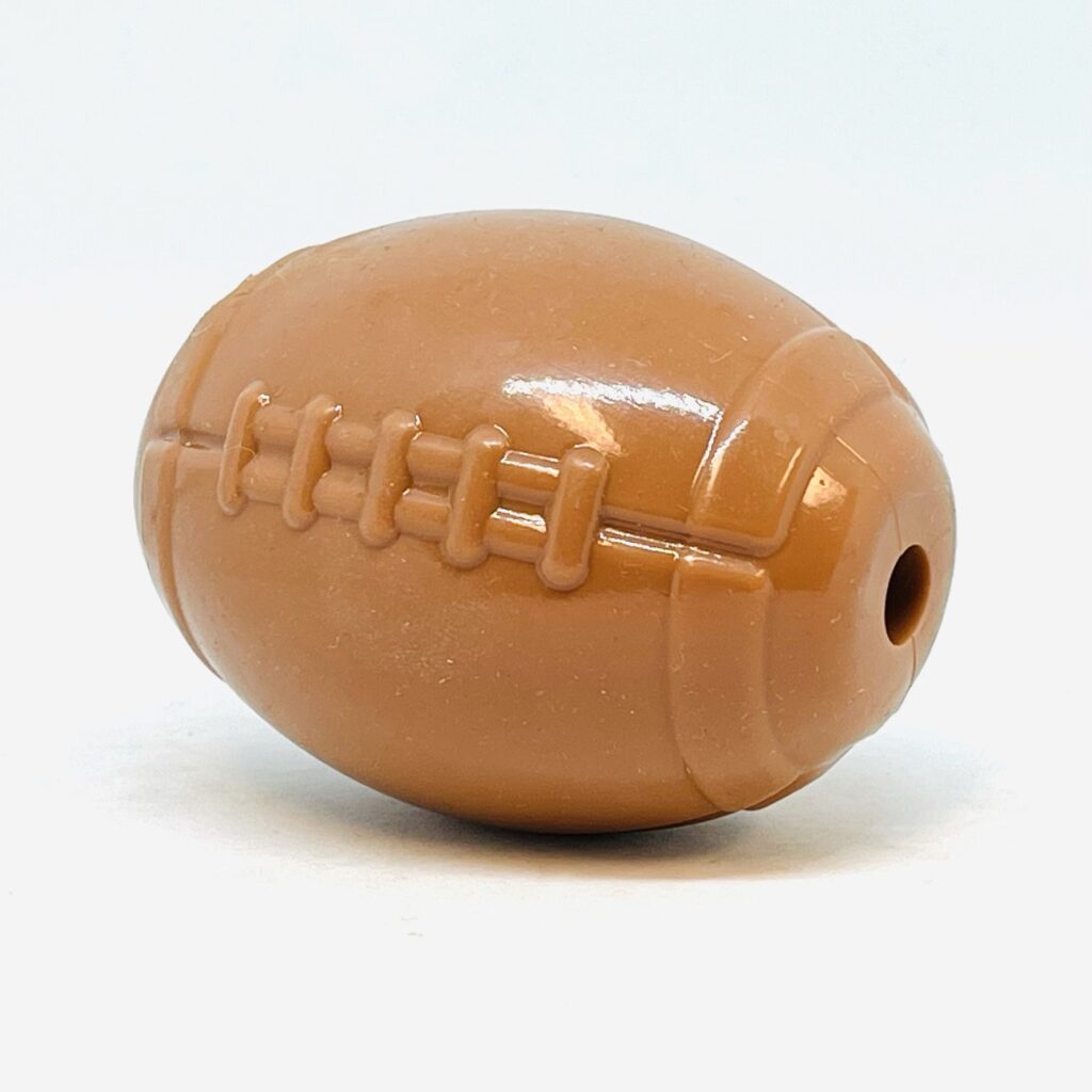 An image of SodaPup – True Dogs, LLC – MKB Football Treat Dispenser – Medium – Brown