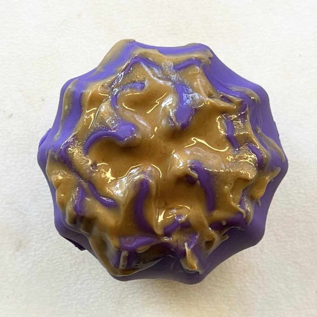 An image of SodaPup – True Dogs, LLC – MKB Cross Bones Treat Pocket – Purple