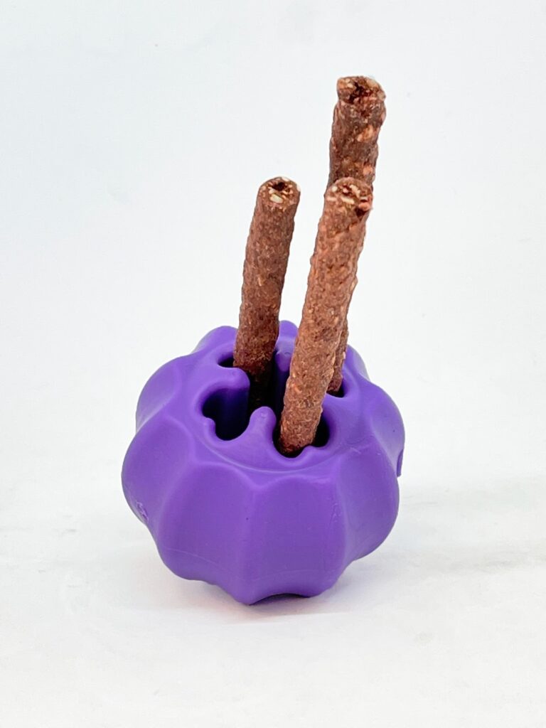 An image of SodaPup – True Dogs, LLC – MKB Cross Bones Treat Pocket – Purple