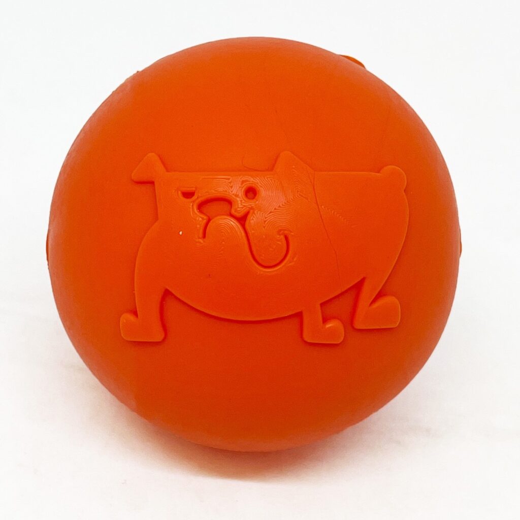 An image of SodaPup – True Dogs, LLC – SP TPE Smile Ball Medium – Bright Orange