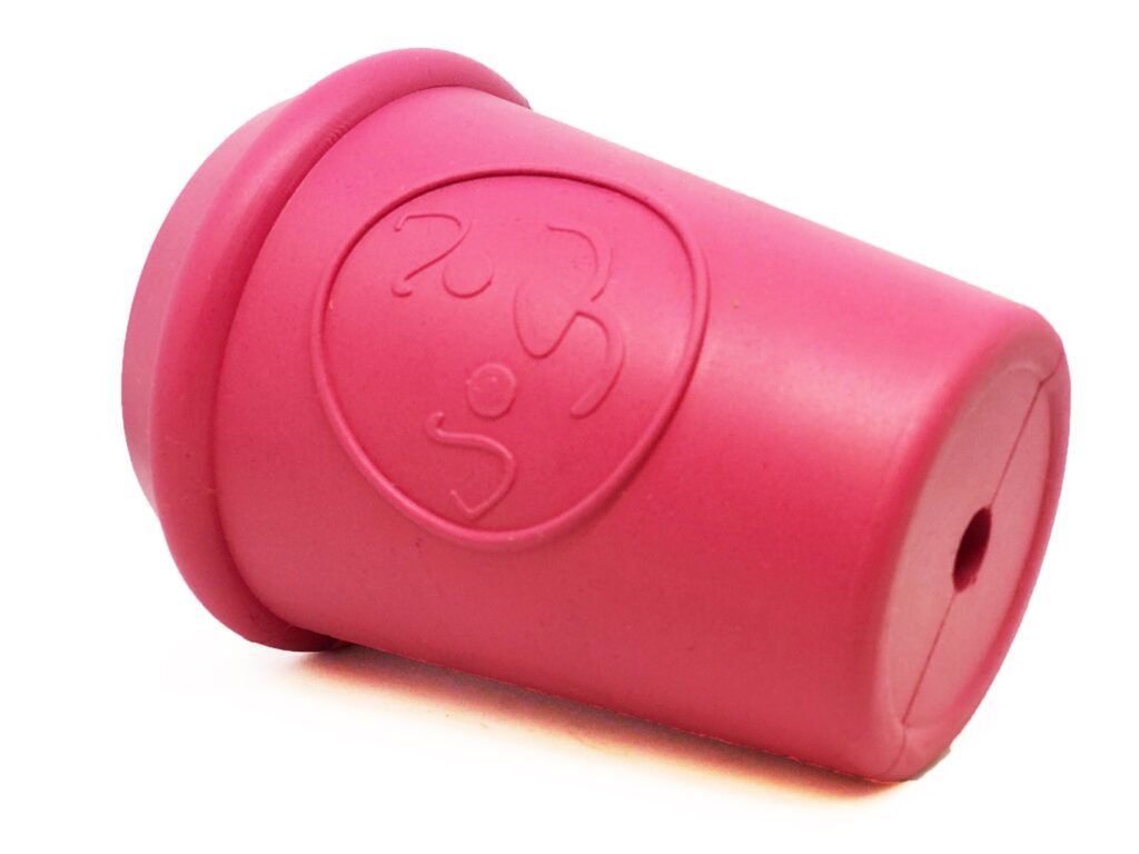 An image of SodaPup – True Dogs, LLC – MKB Coffee Cup Treat Dispenser – Medium – pink