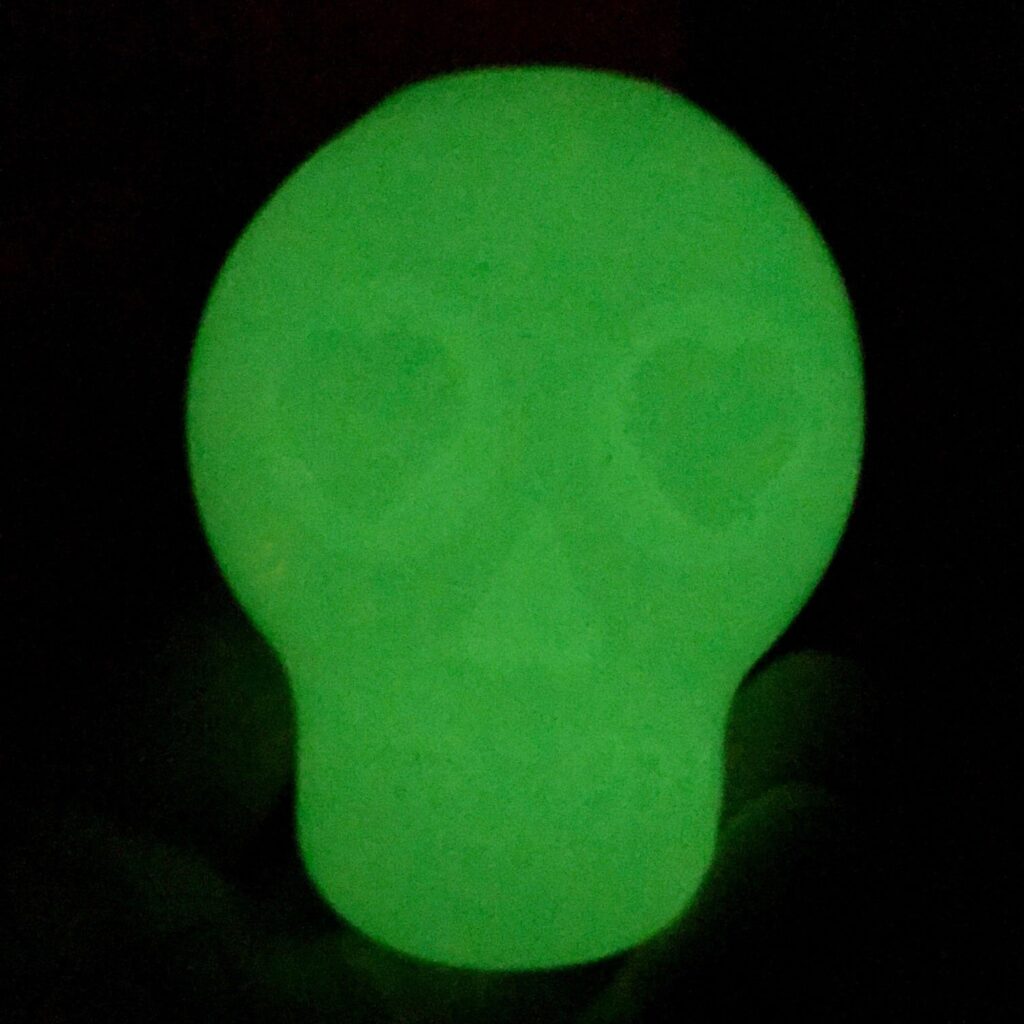 An image of SodaPup – True Dogs, LLC – MKB Skull Treat Dispenser – Medium – Glow In The Dark